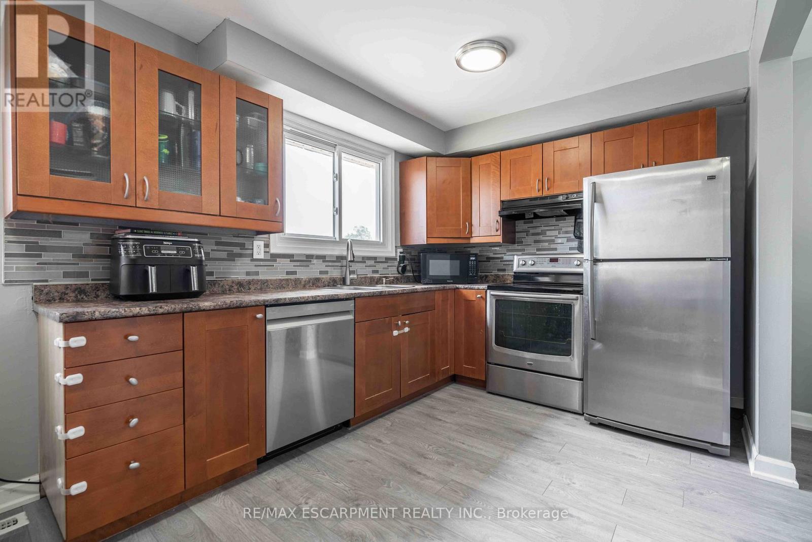 #1 1025 UPPER GAGE AVENUE - 11