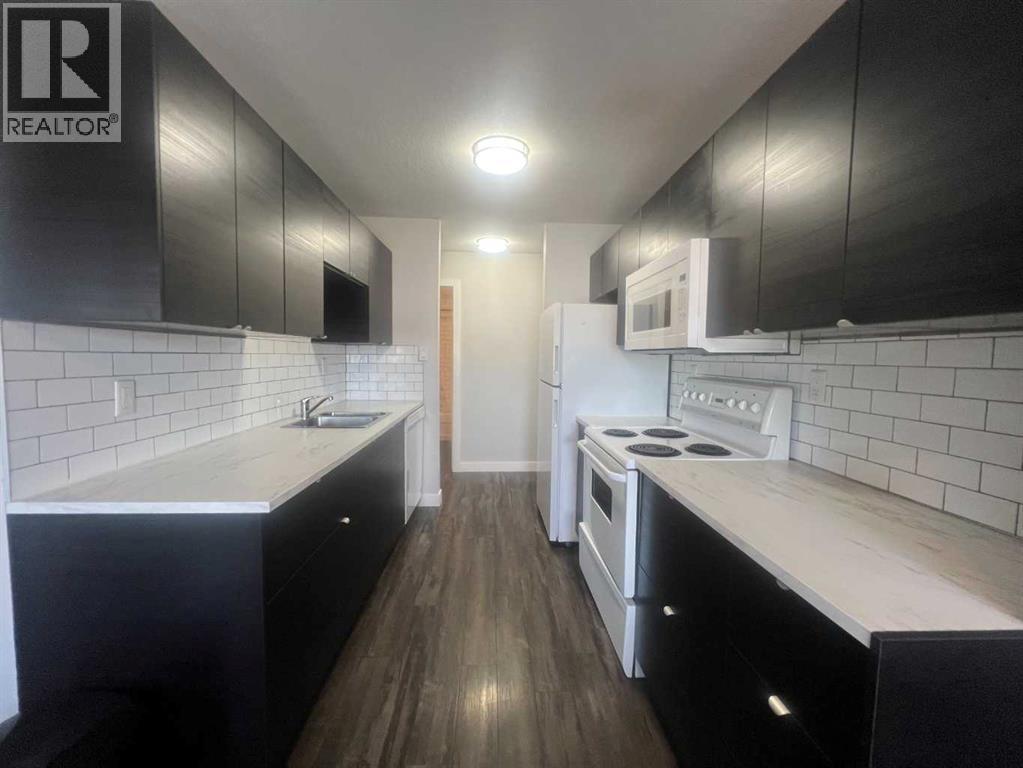#217A 5611 10 Avenue - 3