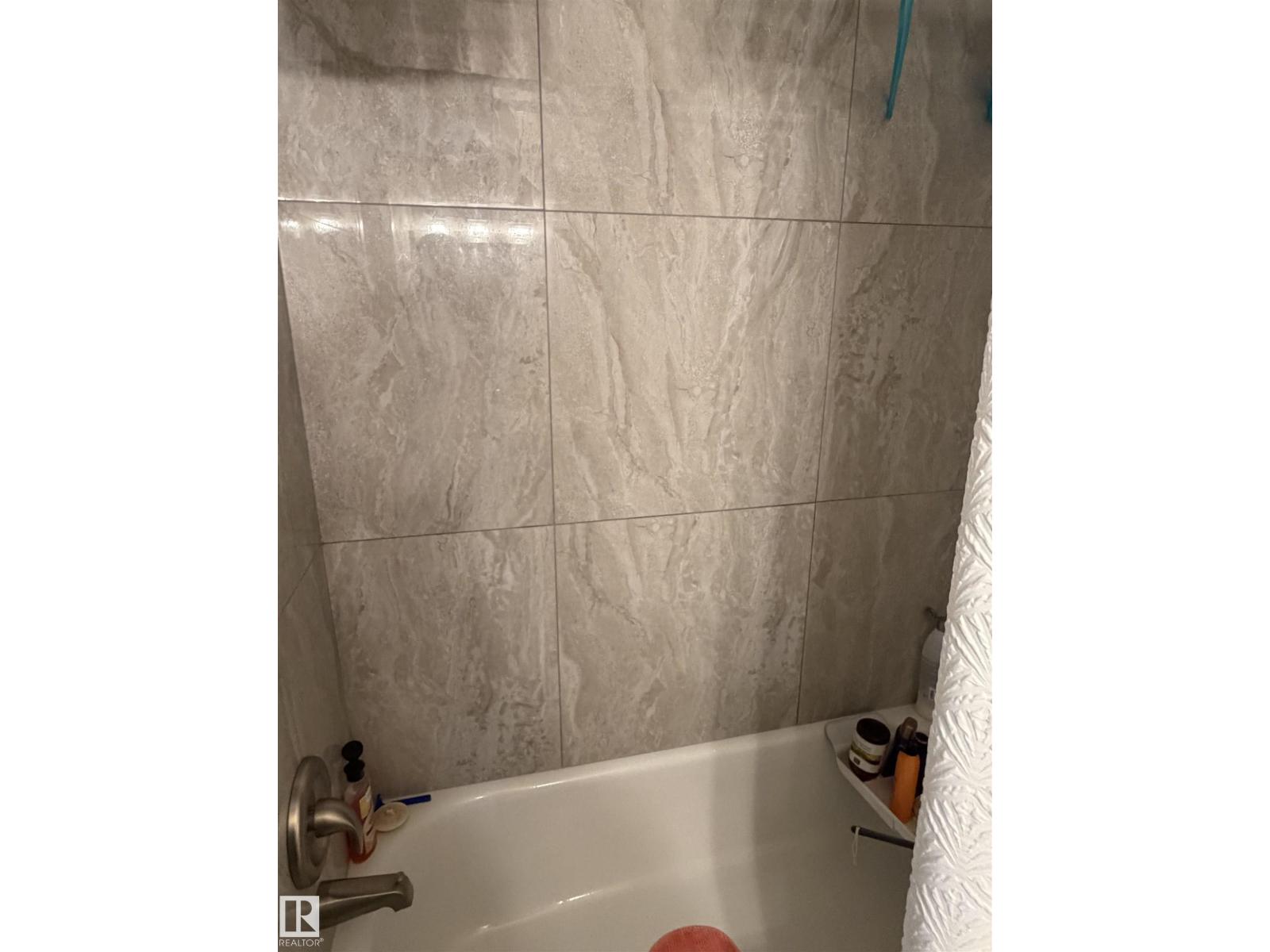 #205 10604 110 AV NW NW - 18