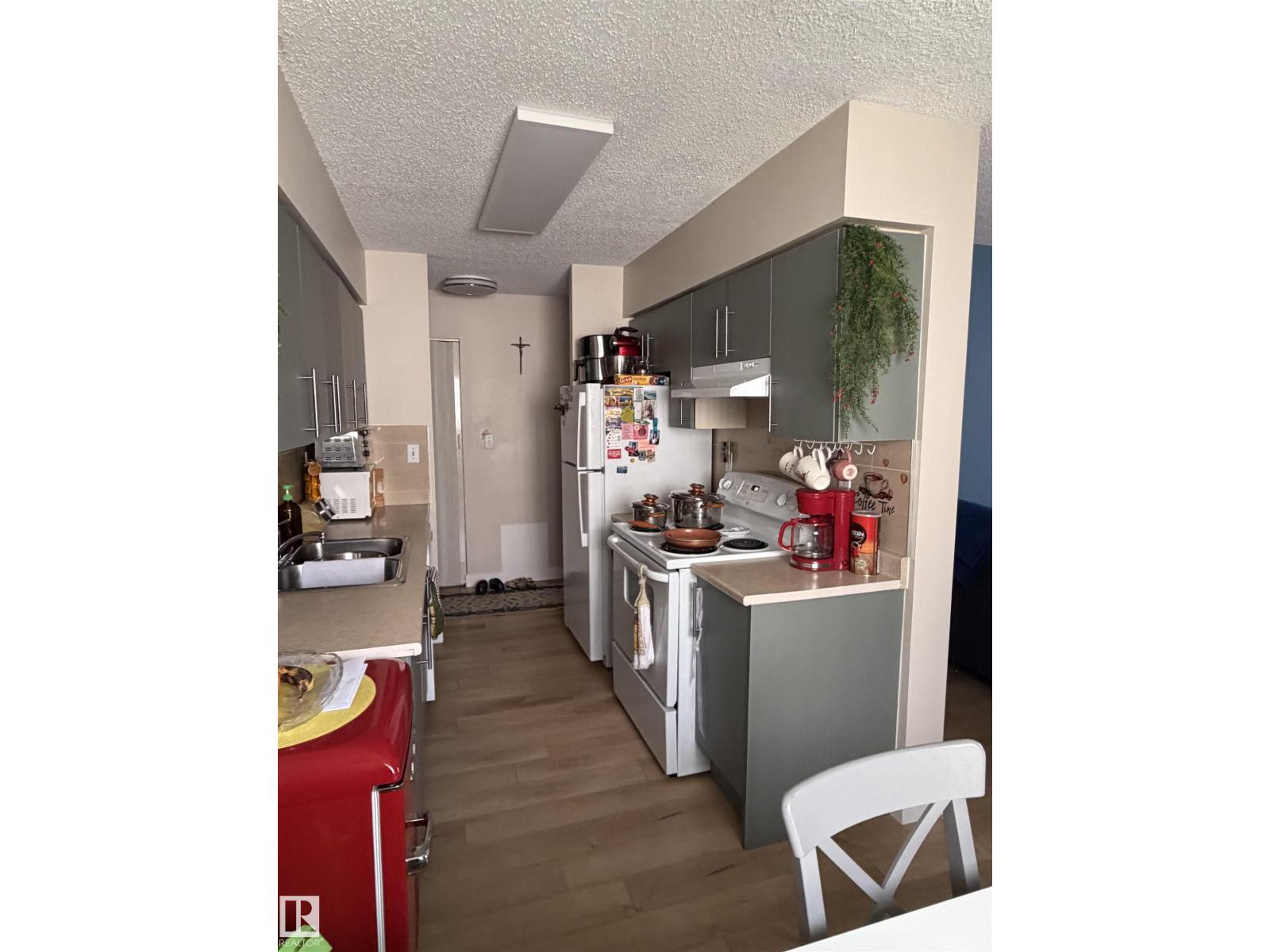 #205 10604 110 AV NW NW - 4