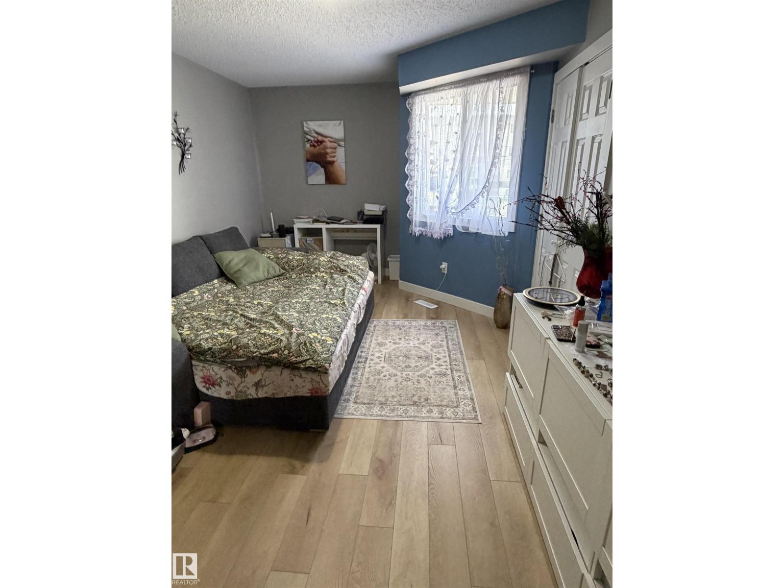 #205 10604 110 AV NW NW - 15