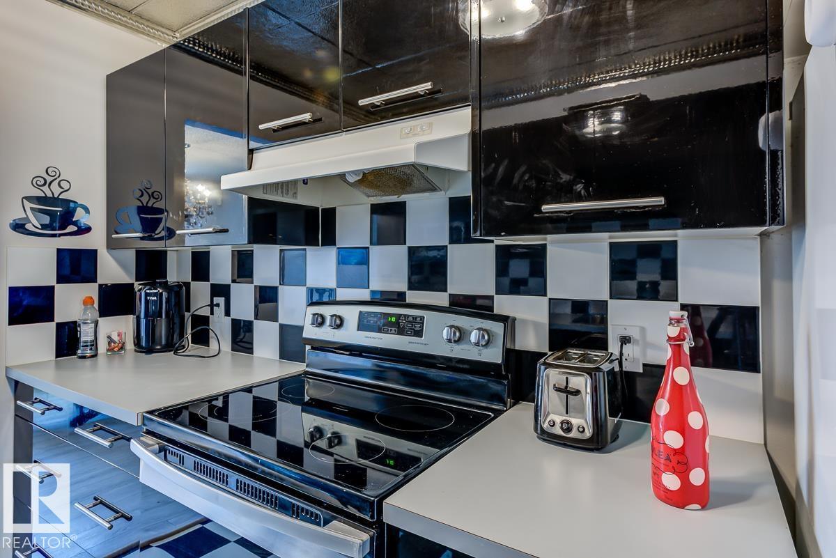 #302 9916 113 ST NW - 11