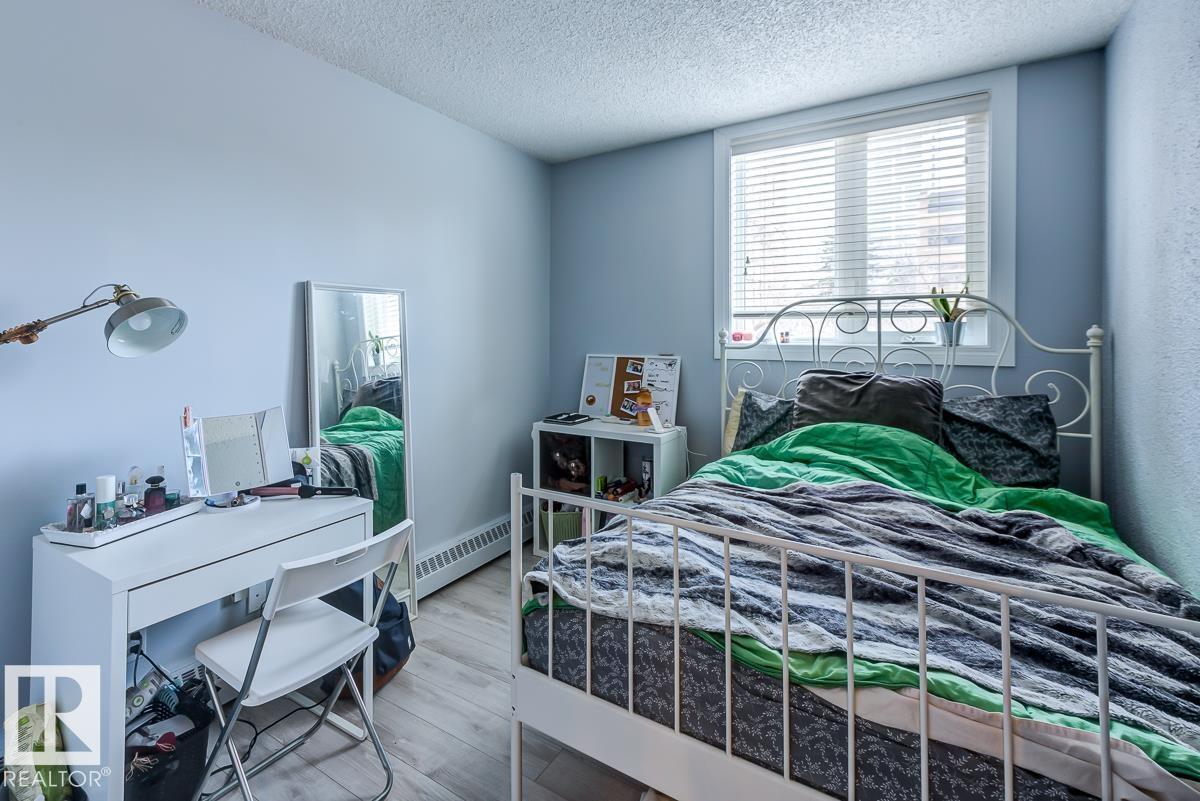 #302 9916 113 ST NW - 18
