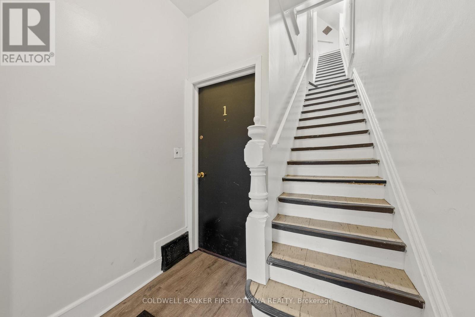 Main common foyer with stairs to unit 2 & 3!