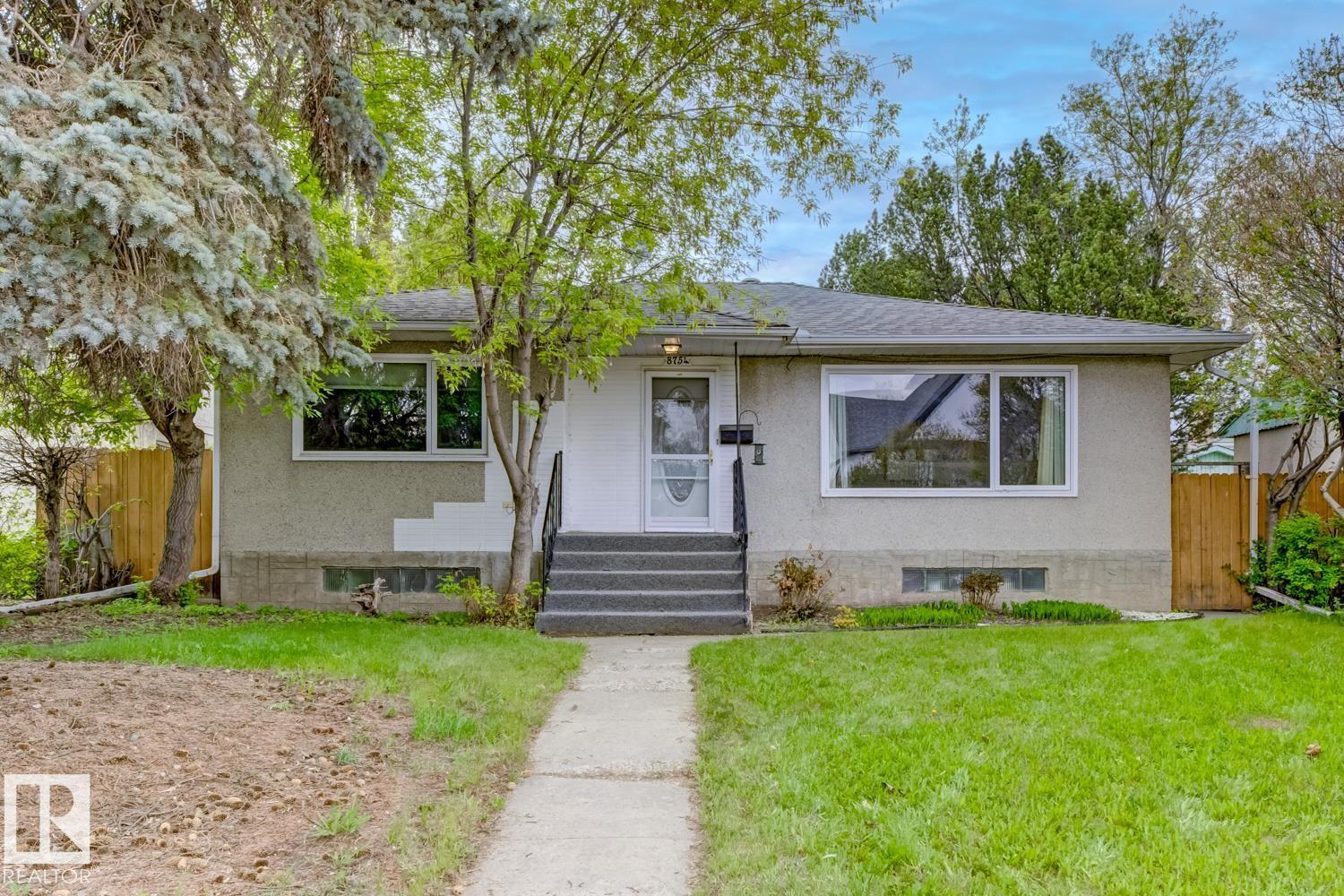 8754 STRATHEARN DR NW NW - 1