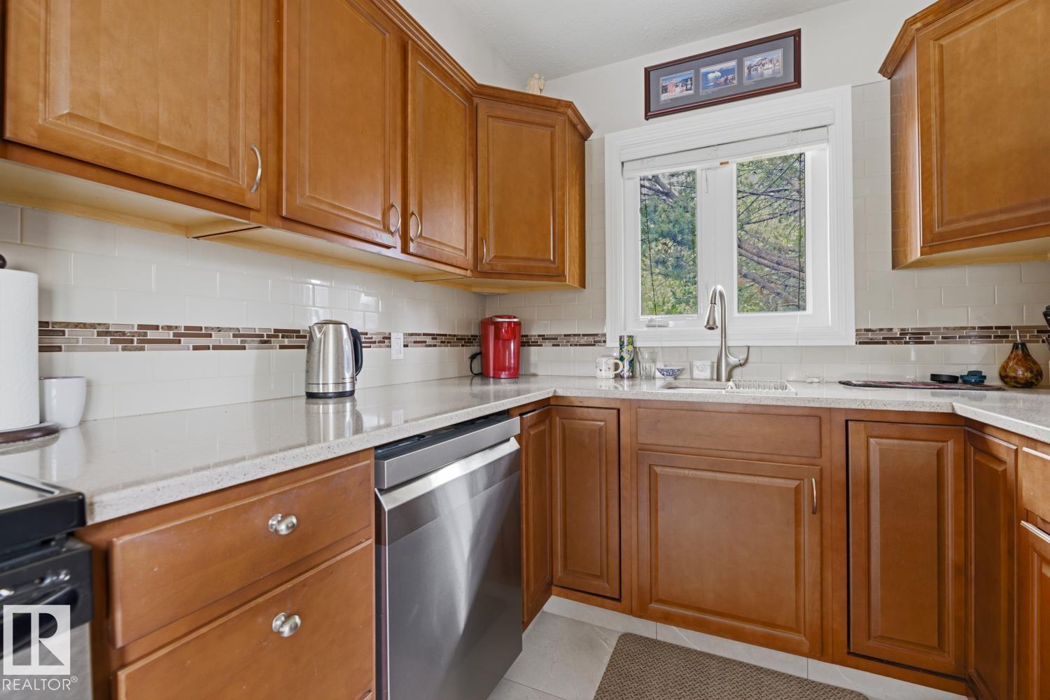 8754 STRATHEARN DR NW NW - 10
