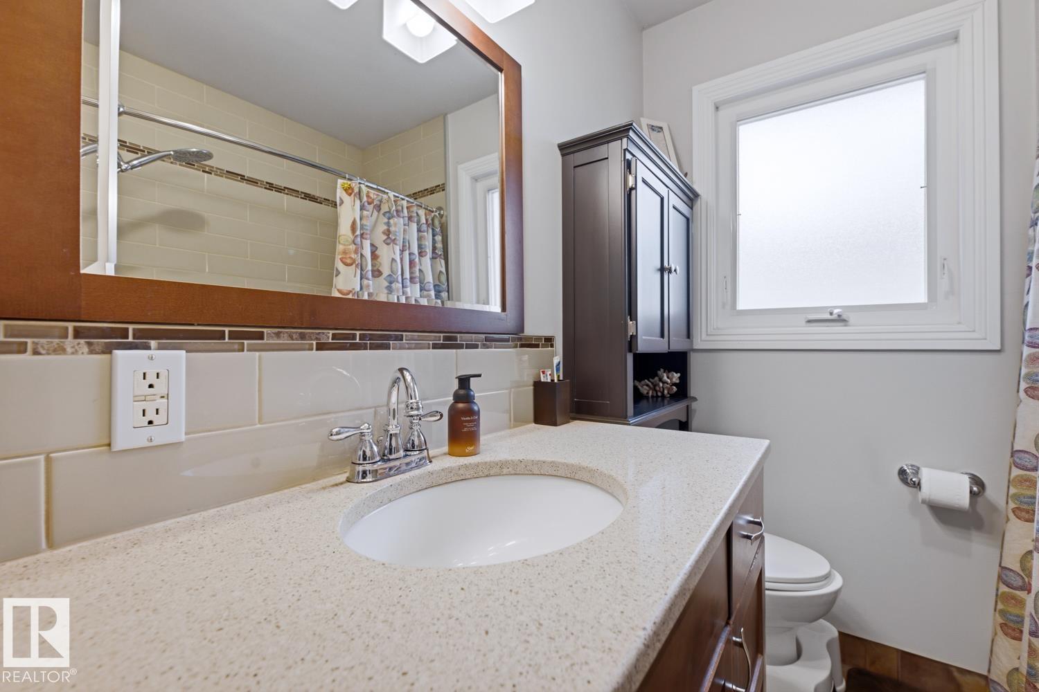8754 STRATHEARN DR NW NW - 22