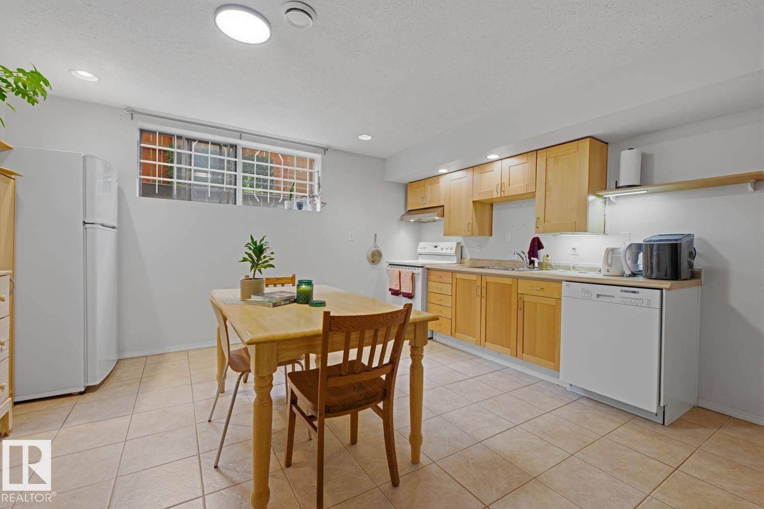 8754 STRATHEARN DR NW NW - 24