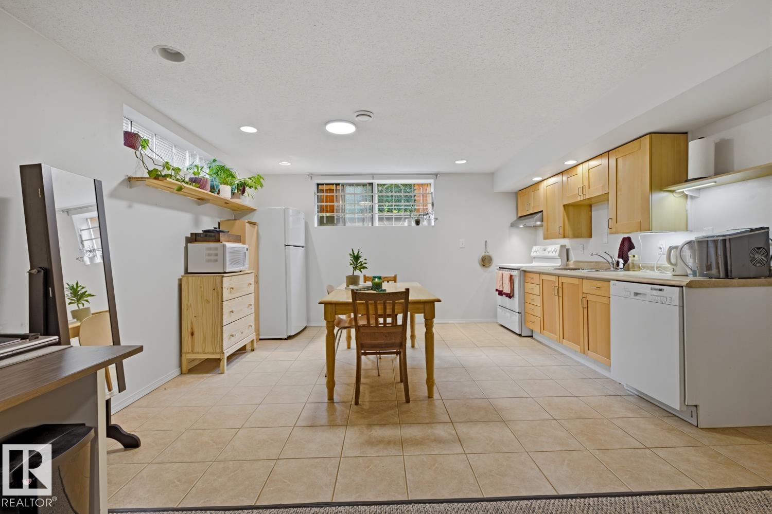 8754 STRATHEARN DR NW NW - 23