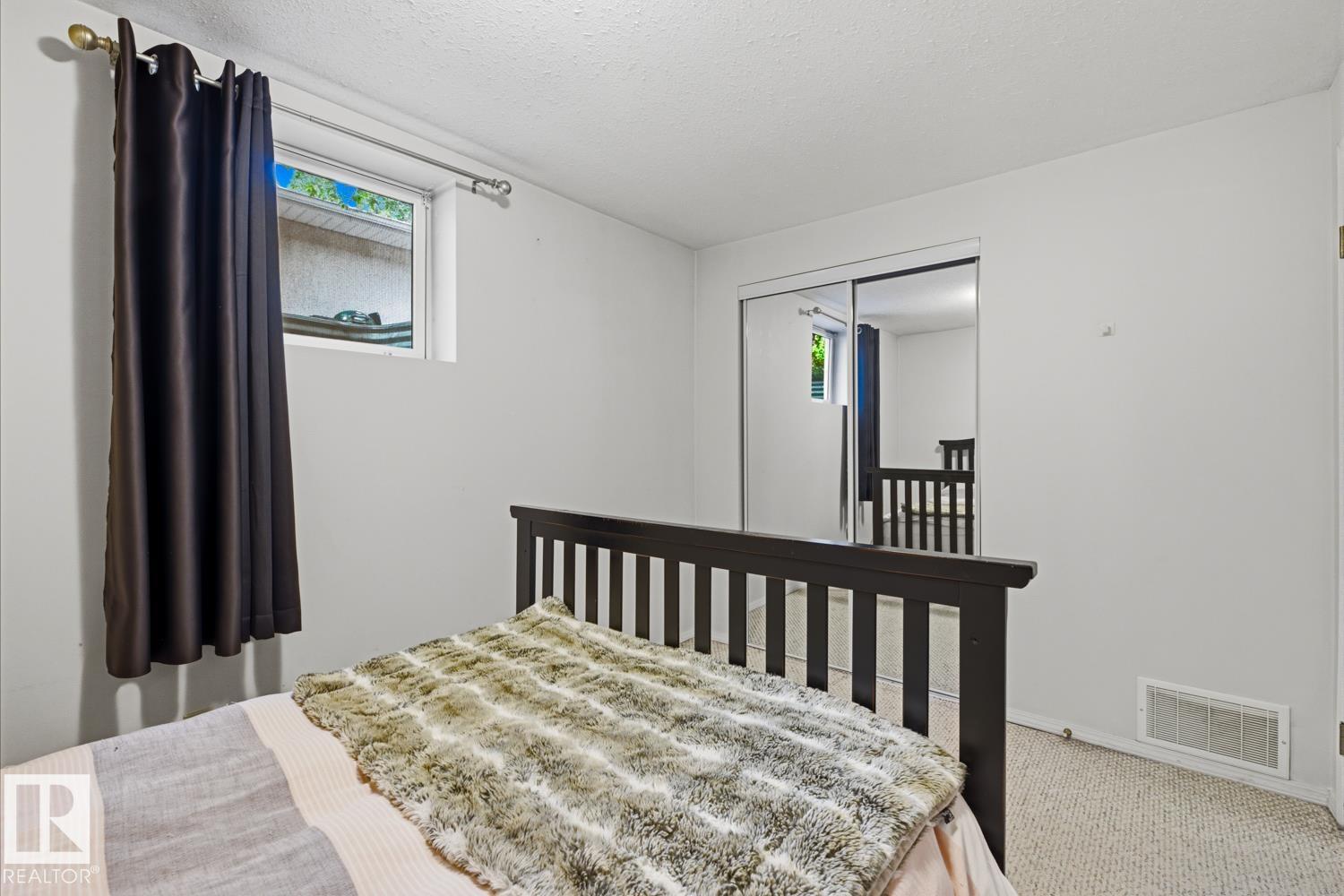 8754 STRATHEARN DR NW NW - 32