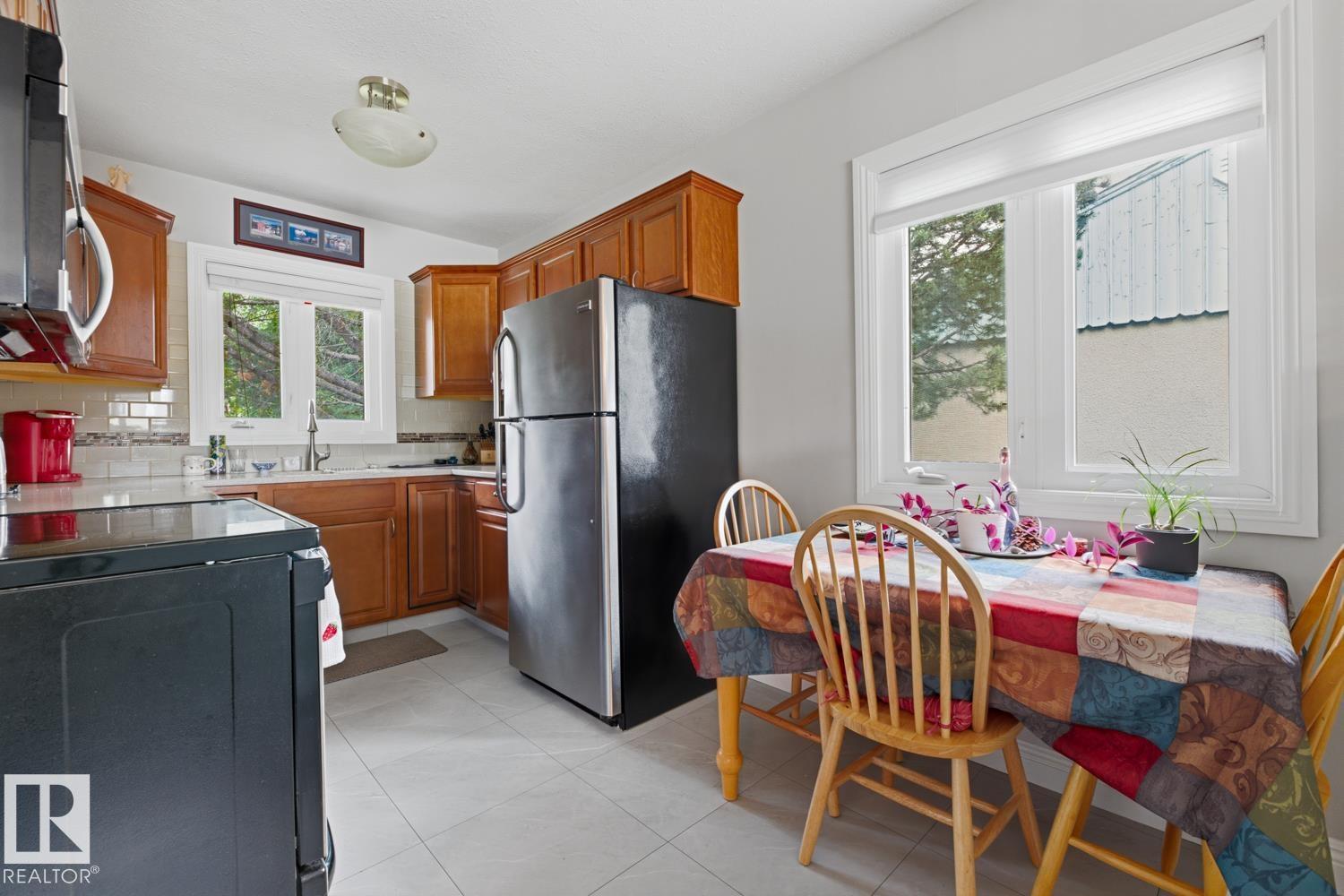 8754 STRATHEARN DR NW NW - 13