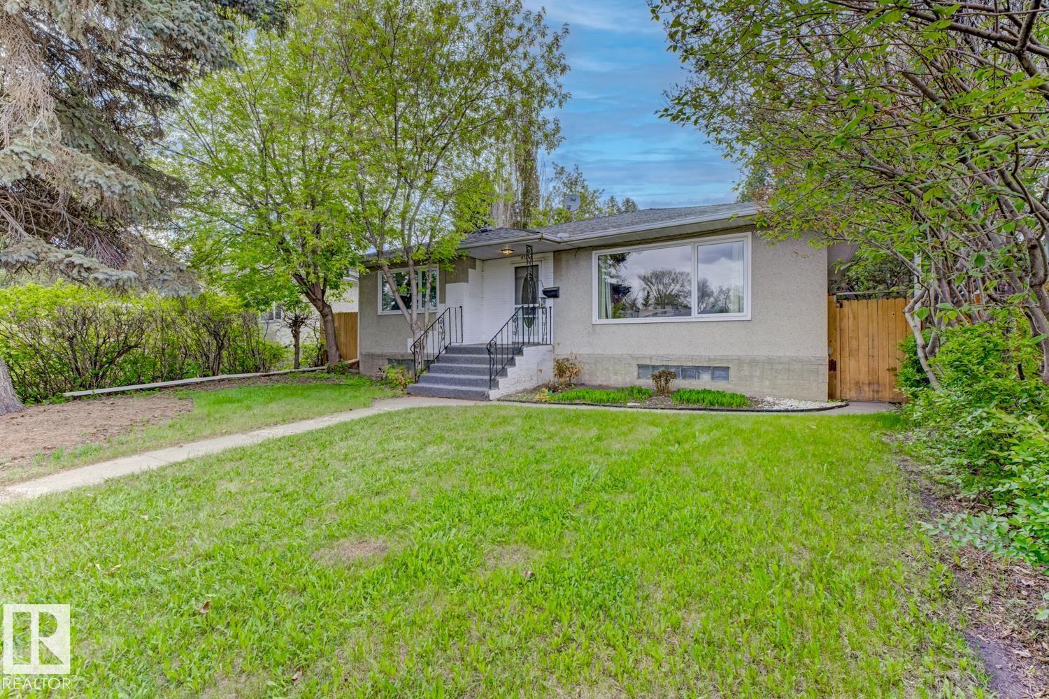 8754 STRATHEARN DR NW NW - 35