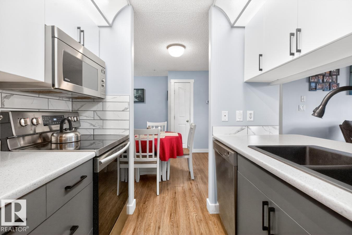 #220 16303 95 ST NW - 11