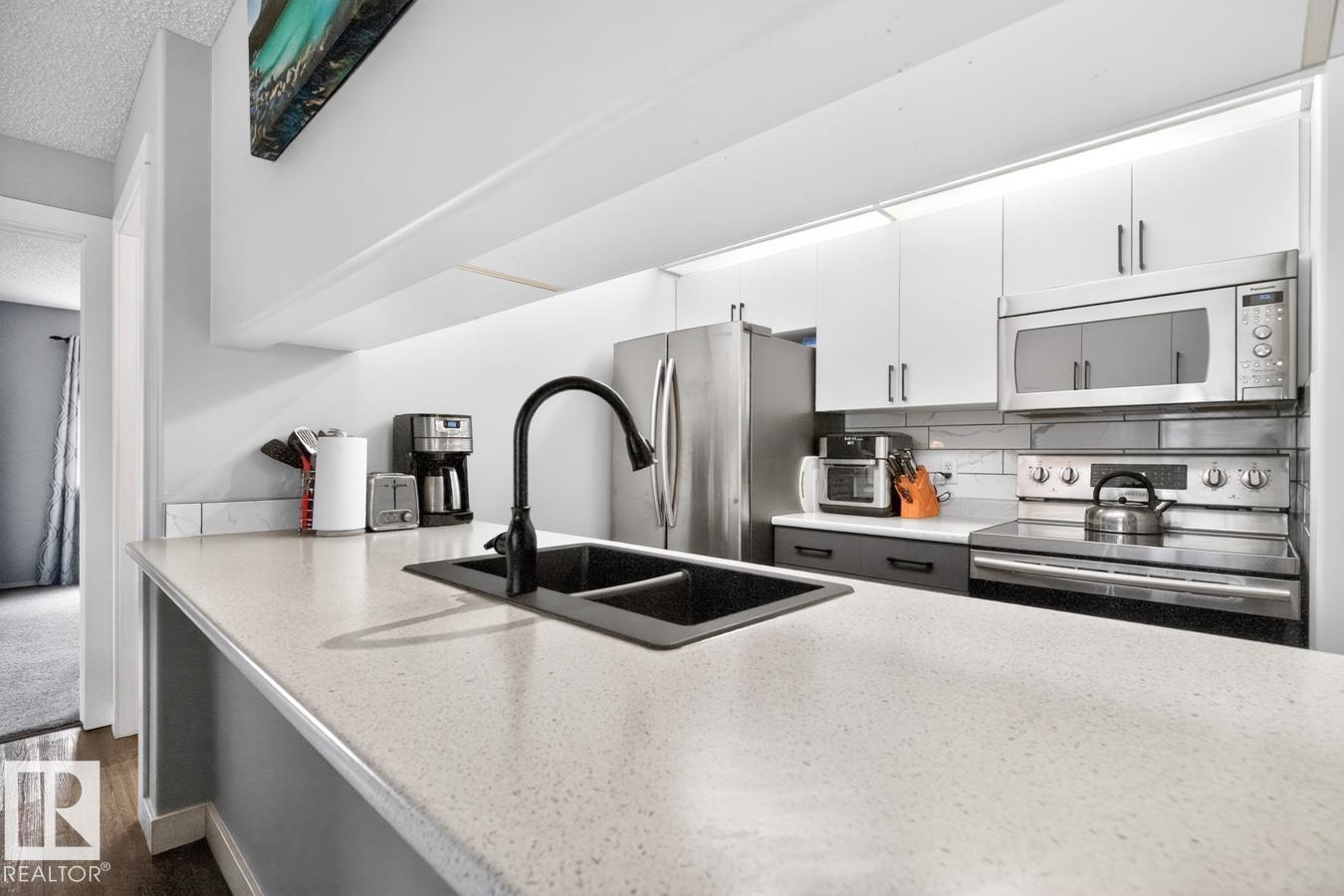 #220 16303 95 ST NW - 12