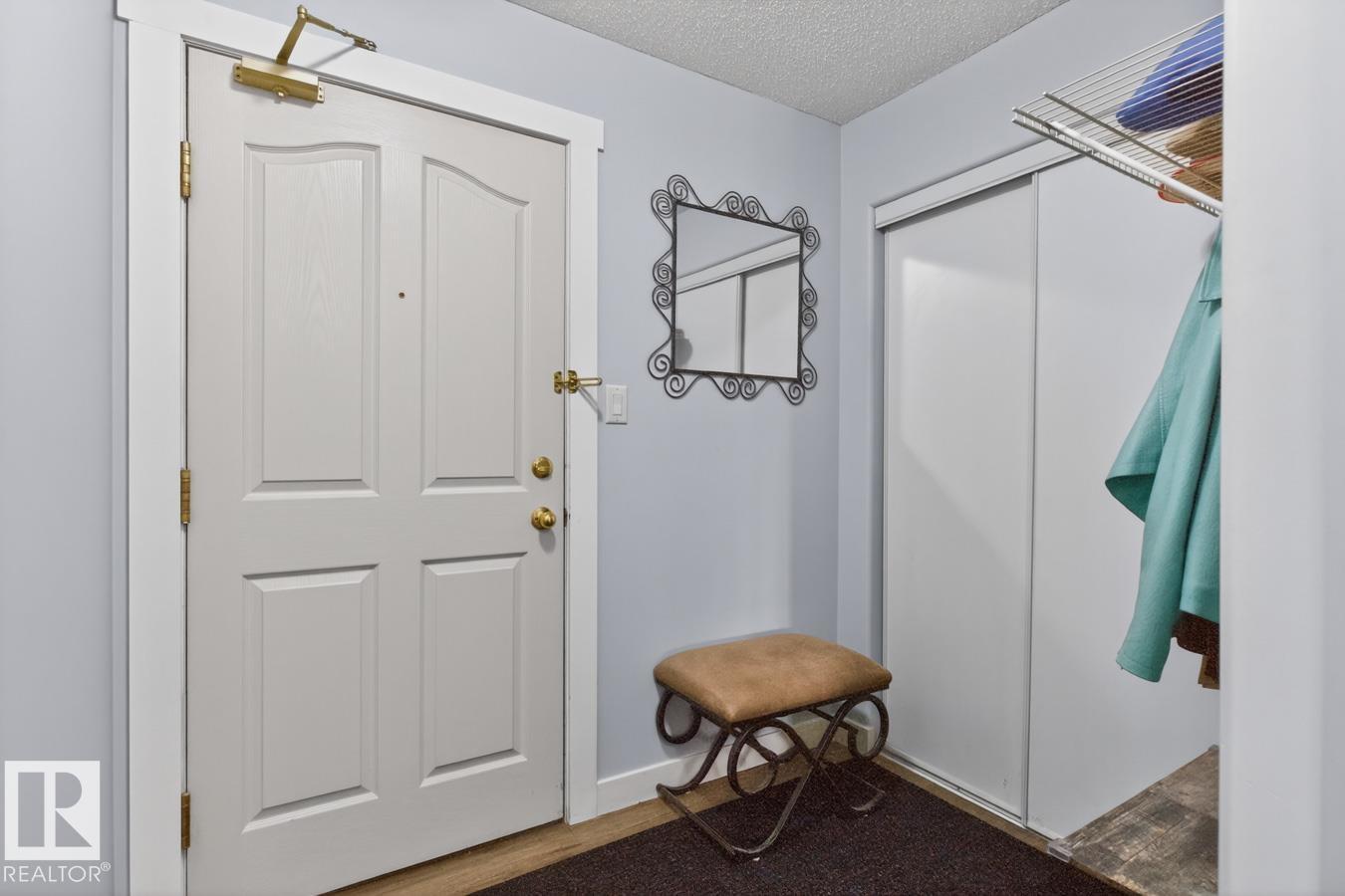 #220 16303 95 ST NW - 4