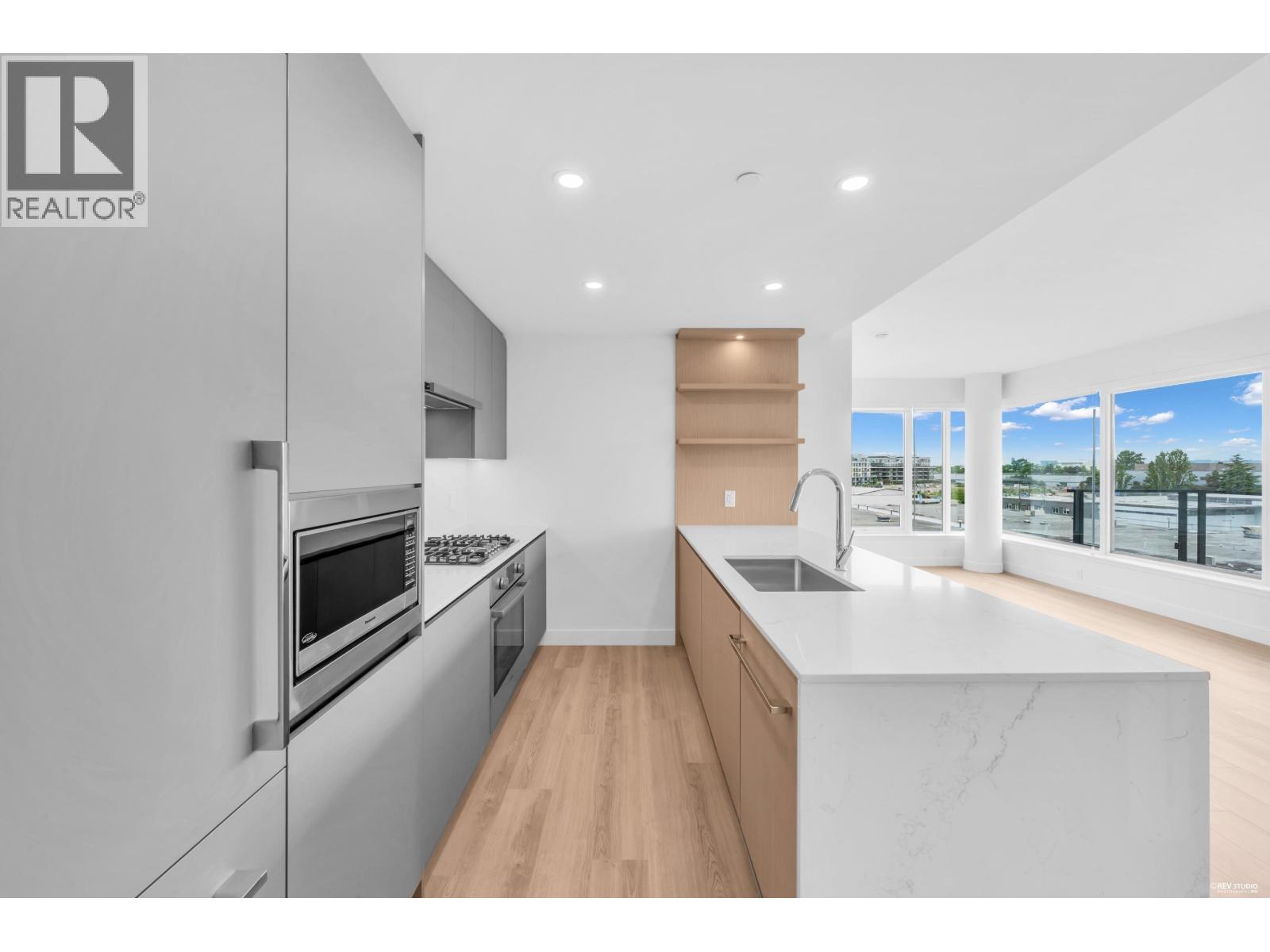 609 5520 MCNAUGHTON Road - photo 2