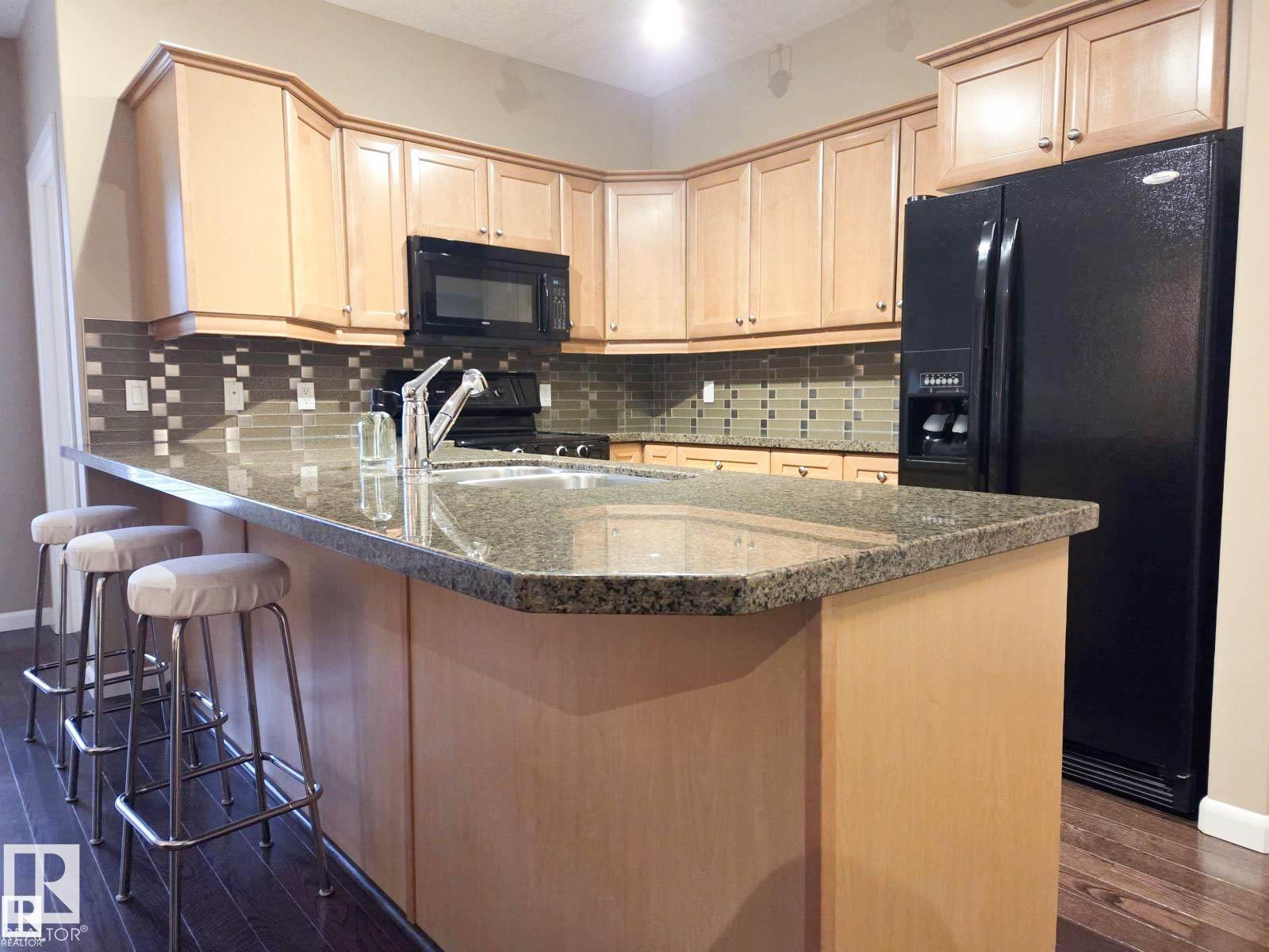 #109 160 MAGRATH RD NW - 4