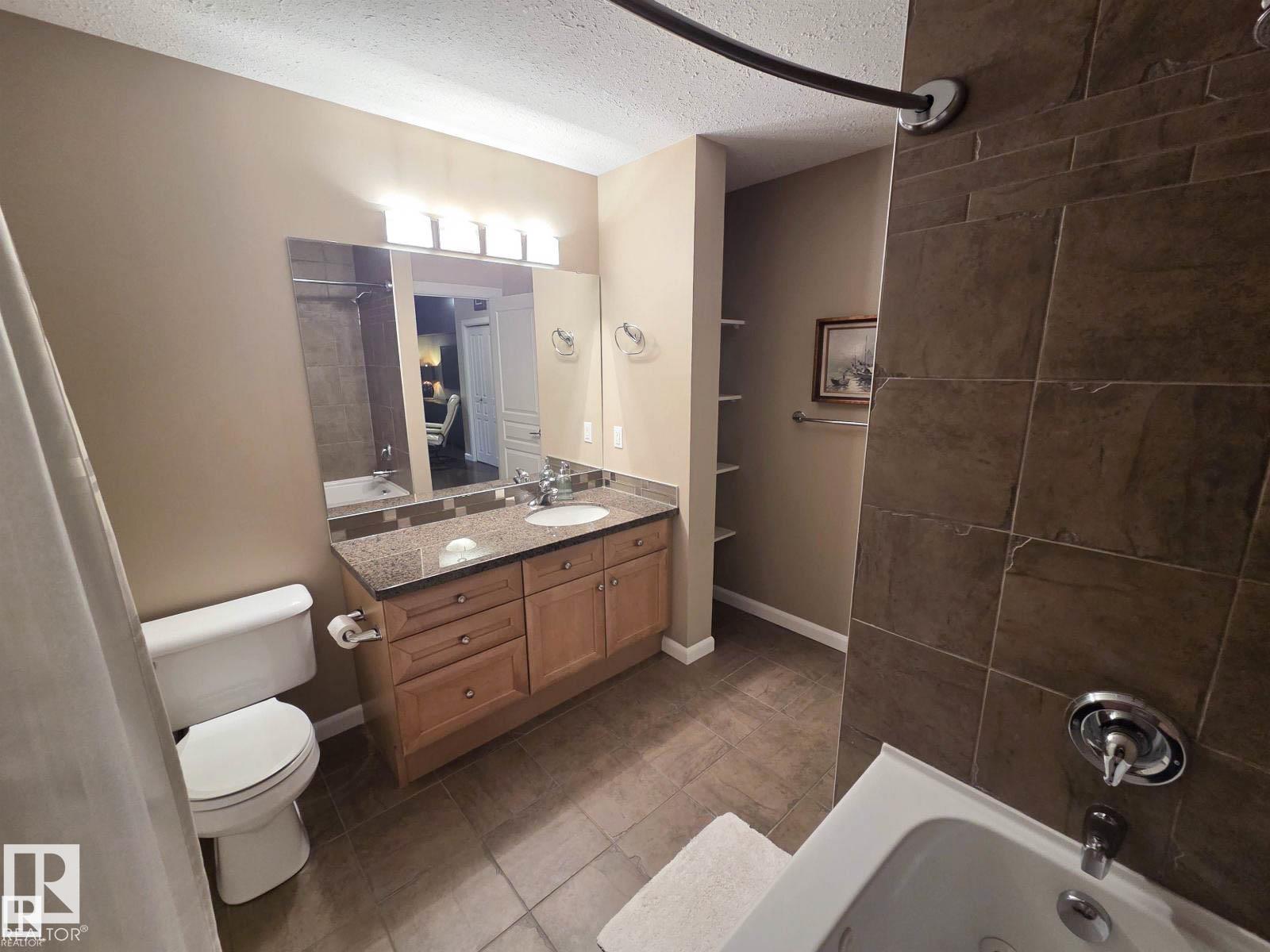 #109 160 MAGRATH RD NW - 10