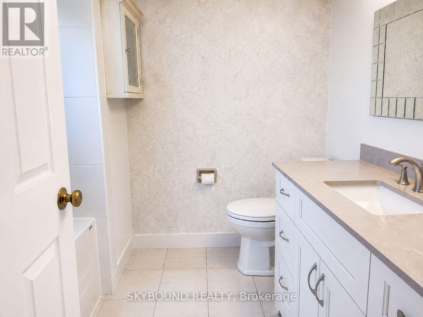 #301 1360 RATHBURN ROAD - 37