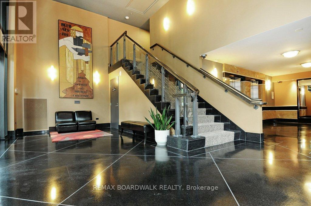 #702 245 KENT STREET - 5