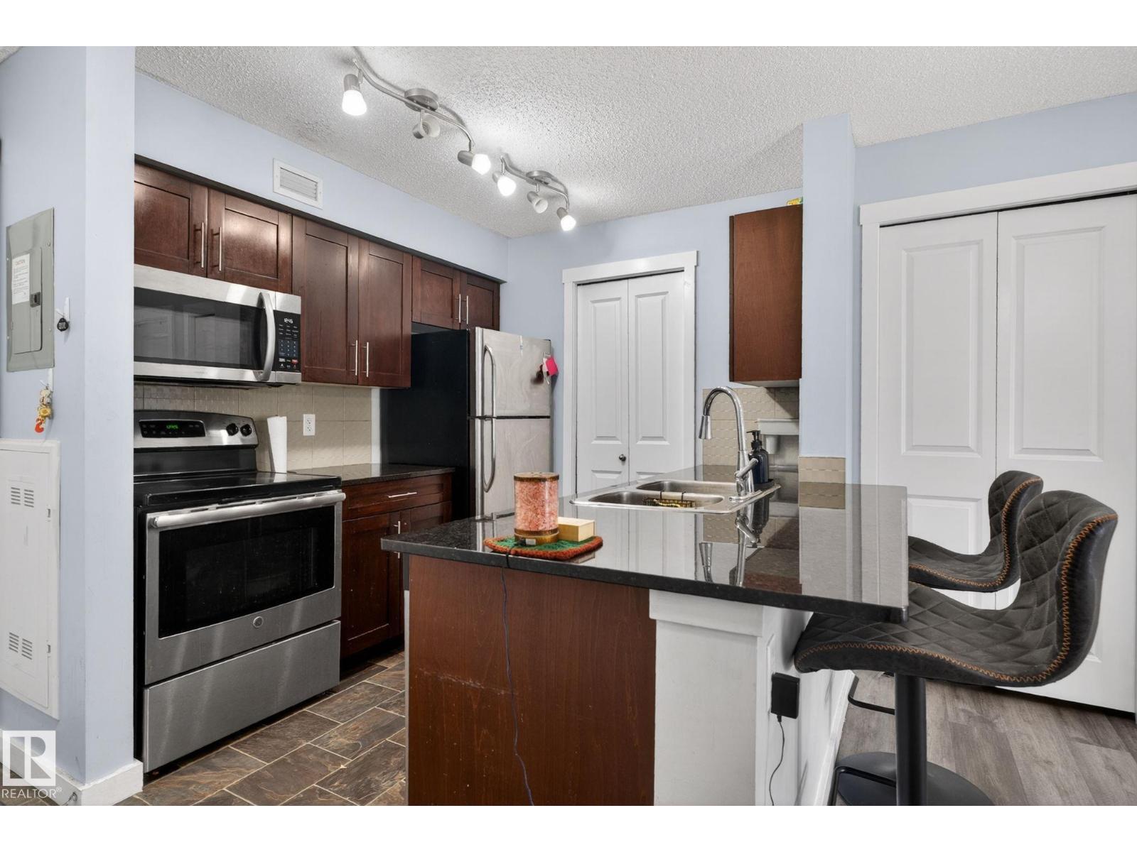 #318 5810 MULLEN PL NW - 5