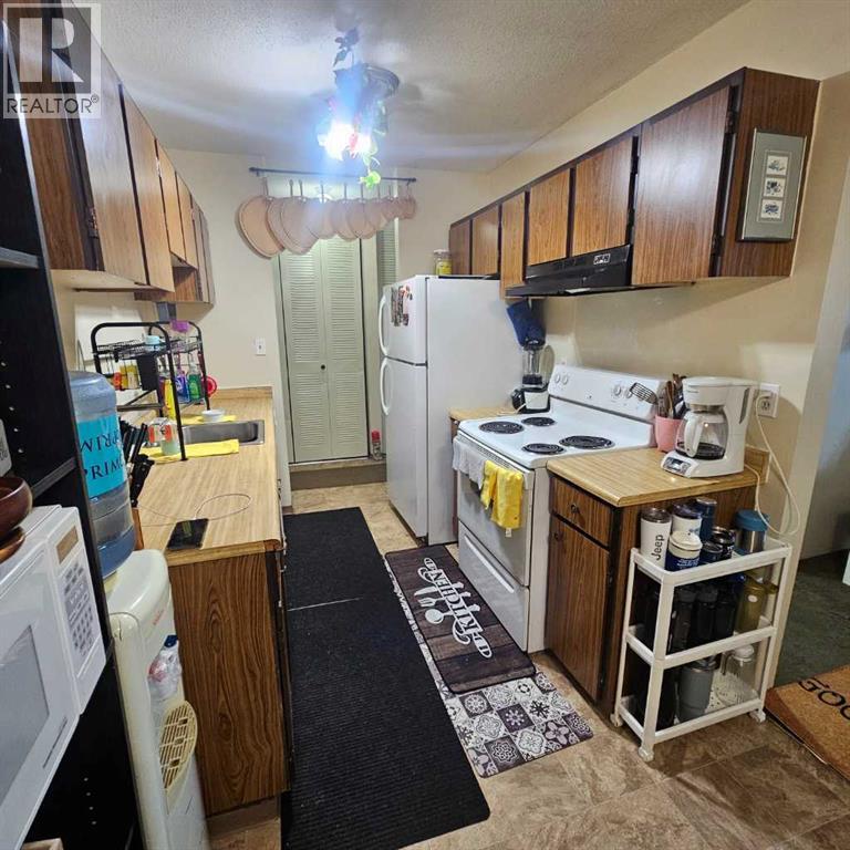 #311 5317 5 Avenue - 7