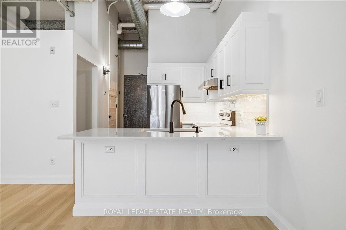 #105 11 REBECCA STREET - 23