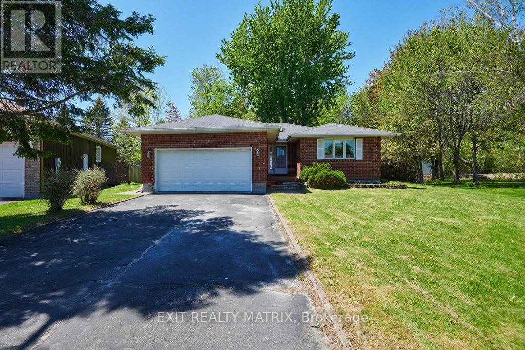 Beautiful home on large, treed lot.
