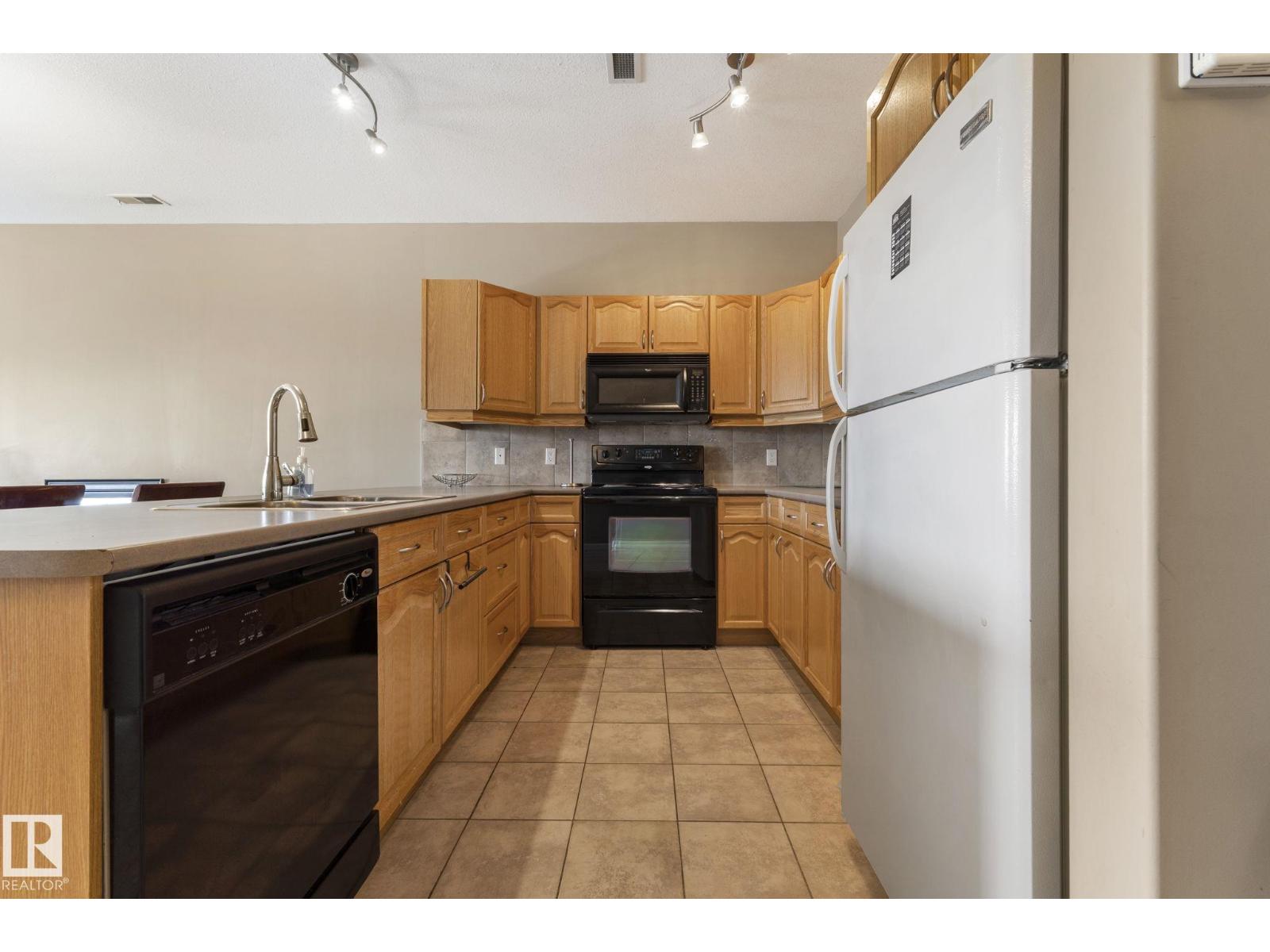 #430 160 MAGRATH RD NW - 26