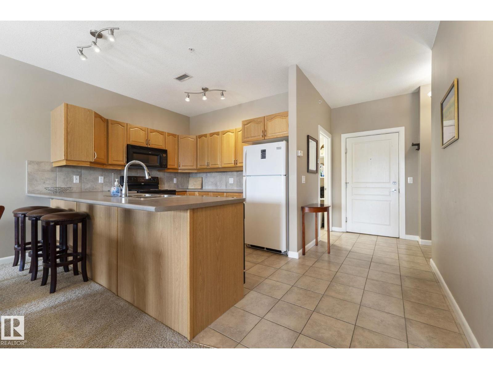 #430 160 MAGRATH RD NW - 23