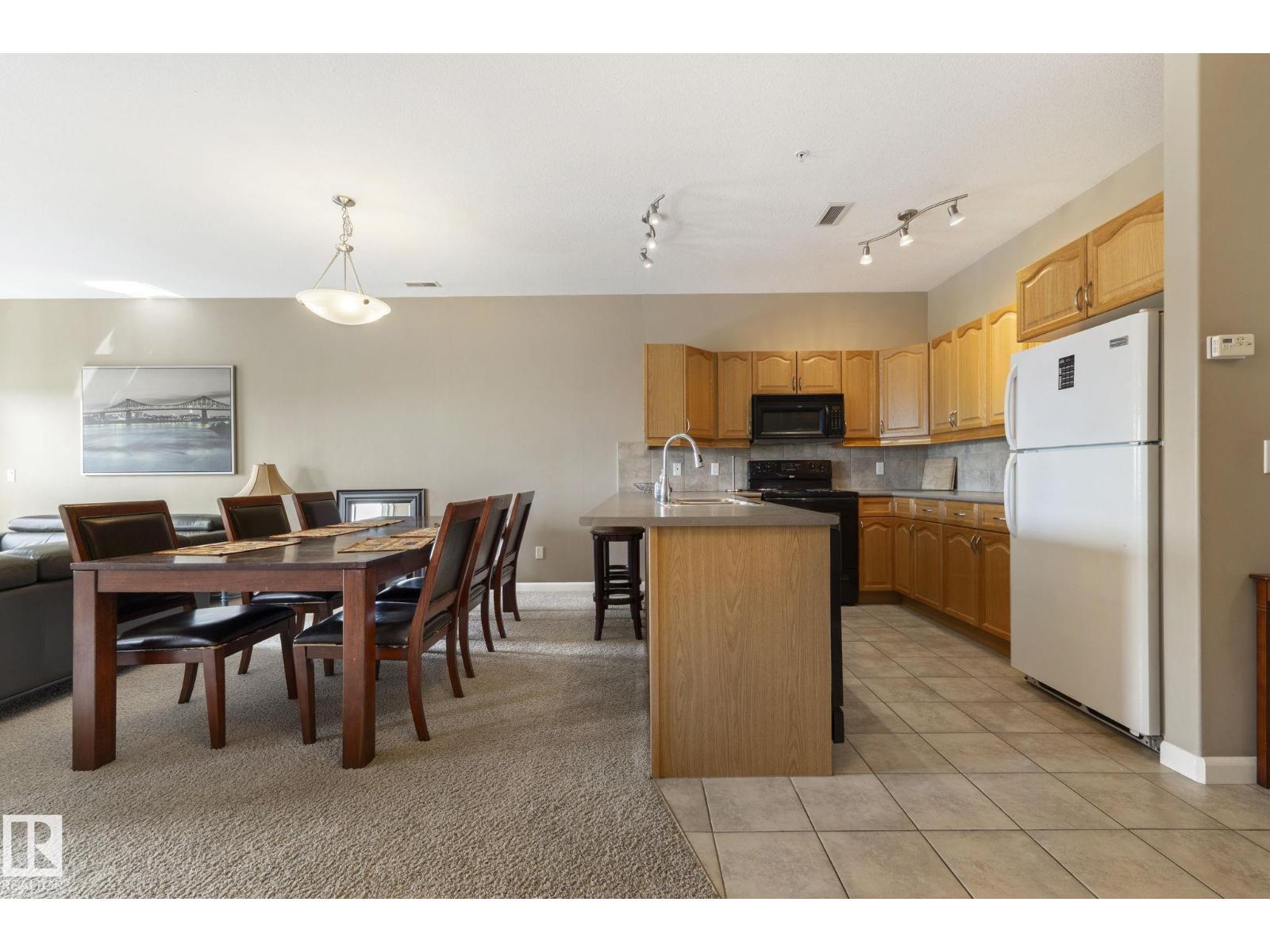 #430 160 MAGRATH RD NW - 24