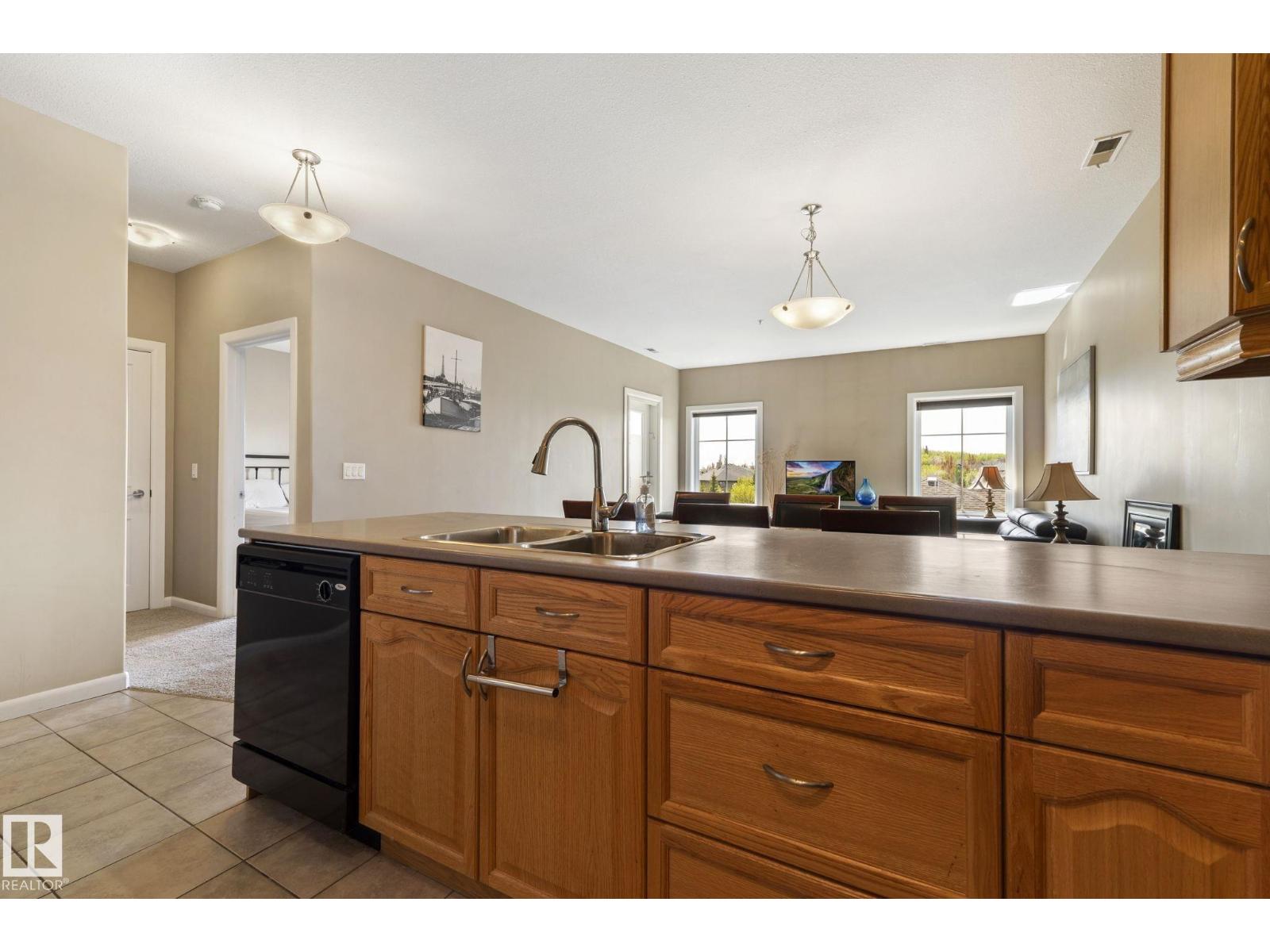 #430 160 MAGRATH RD NW - 28