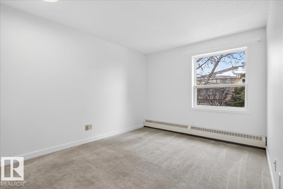 #302 9760 176 ST NW - 23