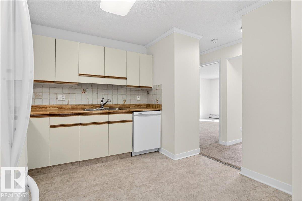 #302 9760 176 ST NW - 12