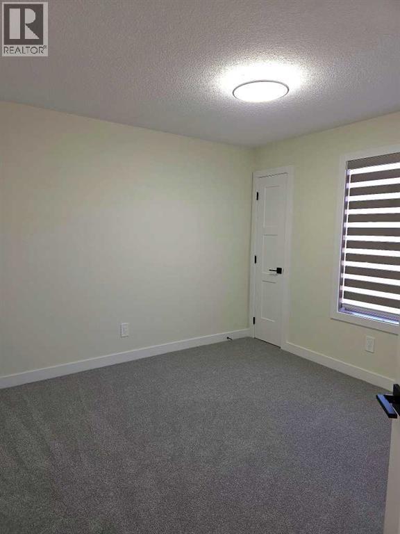 #104 4 Everridge Square SW - 14