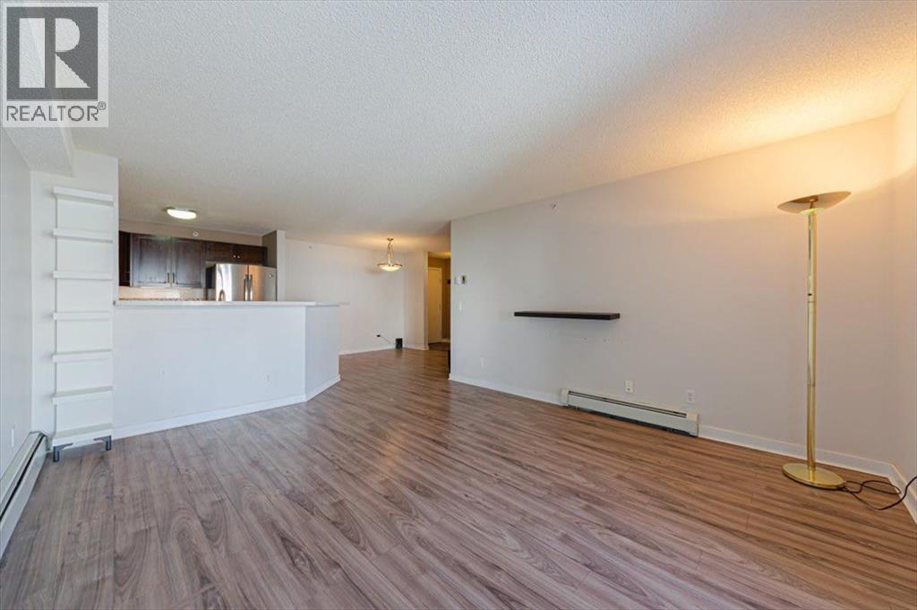 #1424 8810 Royal Birch Boulevard NW - 23