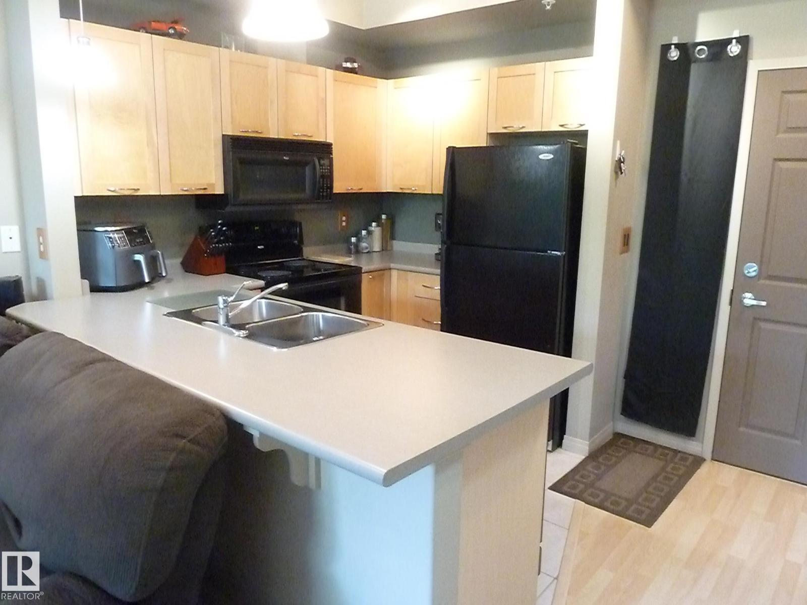 #1-104 4245 139 AV NW - 10