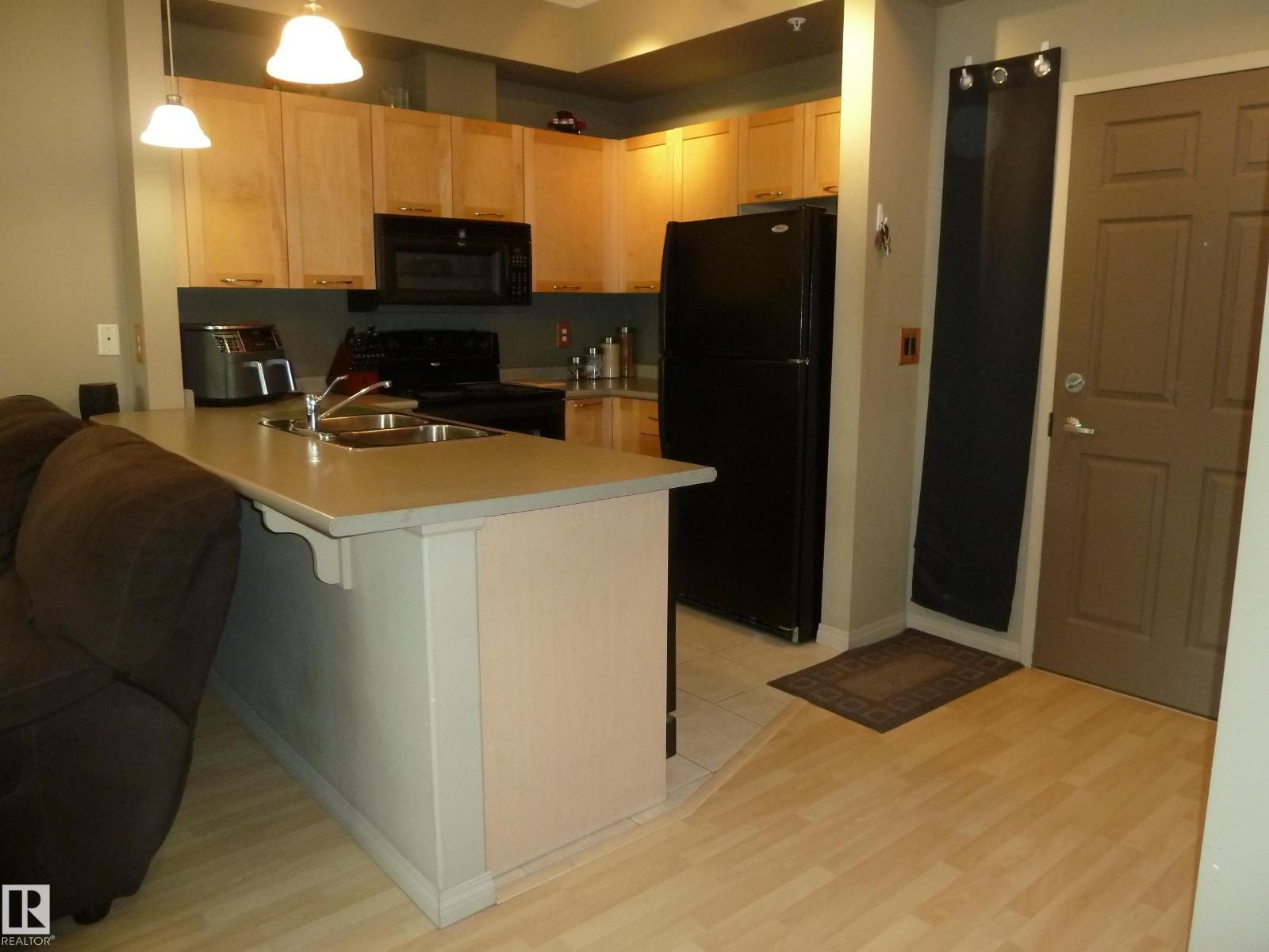 #1-104 4245 139 AV NW - 11