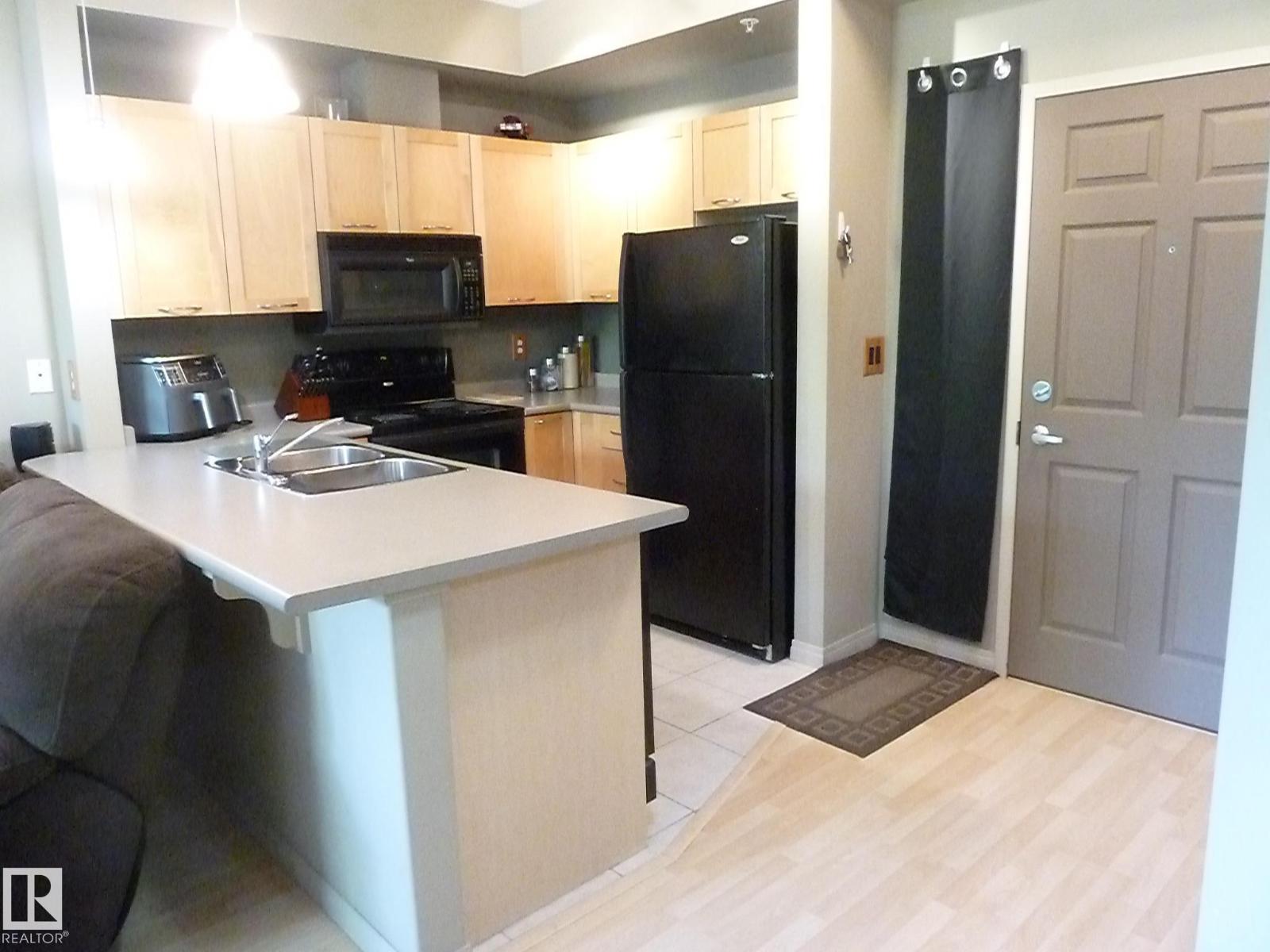 #1-104 4245 139 AV NW - 9