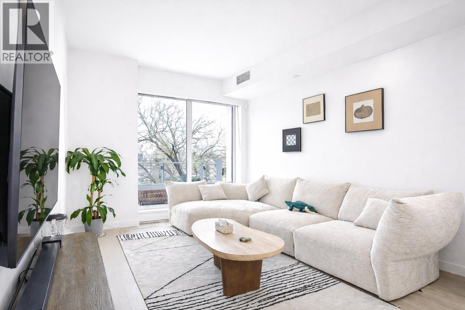 303 6833 PEARSON Way - main photo