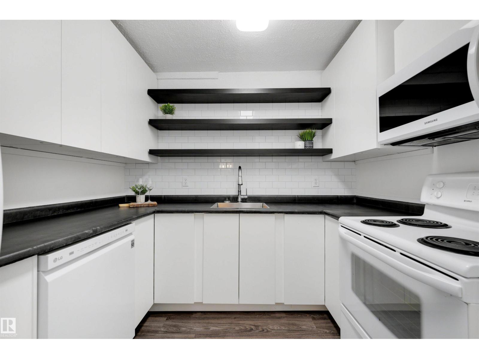 #103 10138 116 ST NW - 8