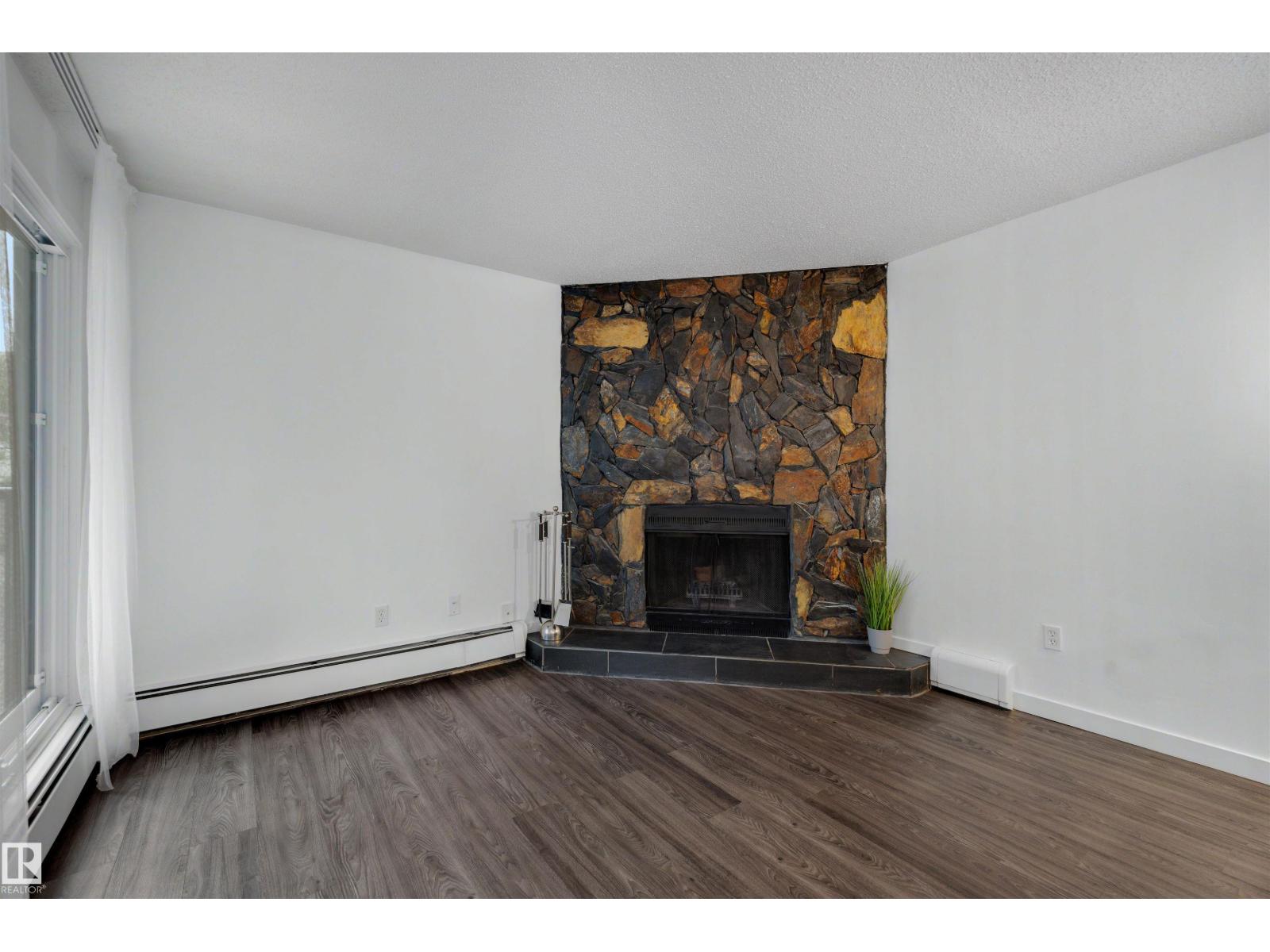#103 10138 116 ST NW - 15