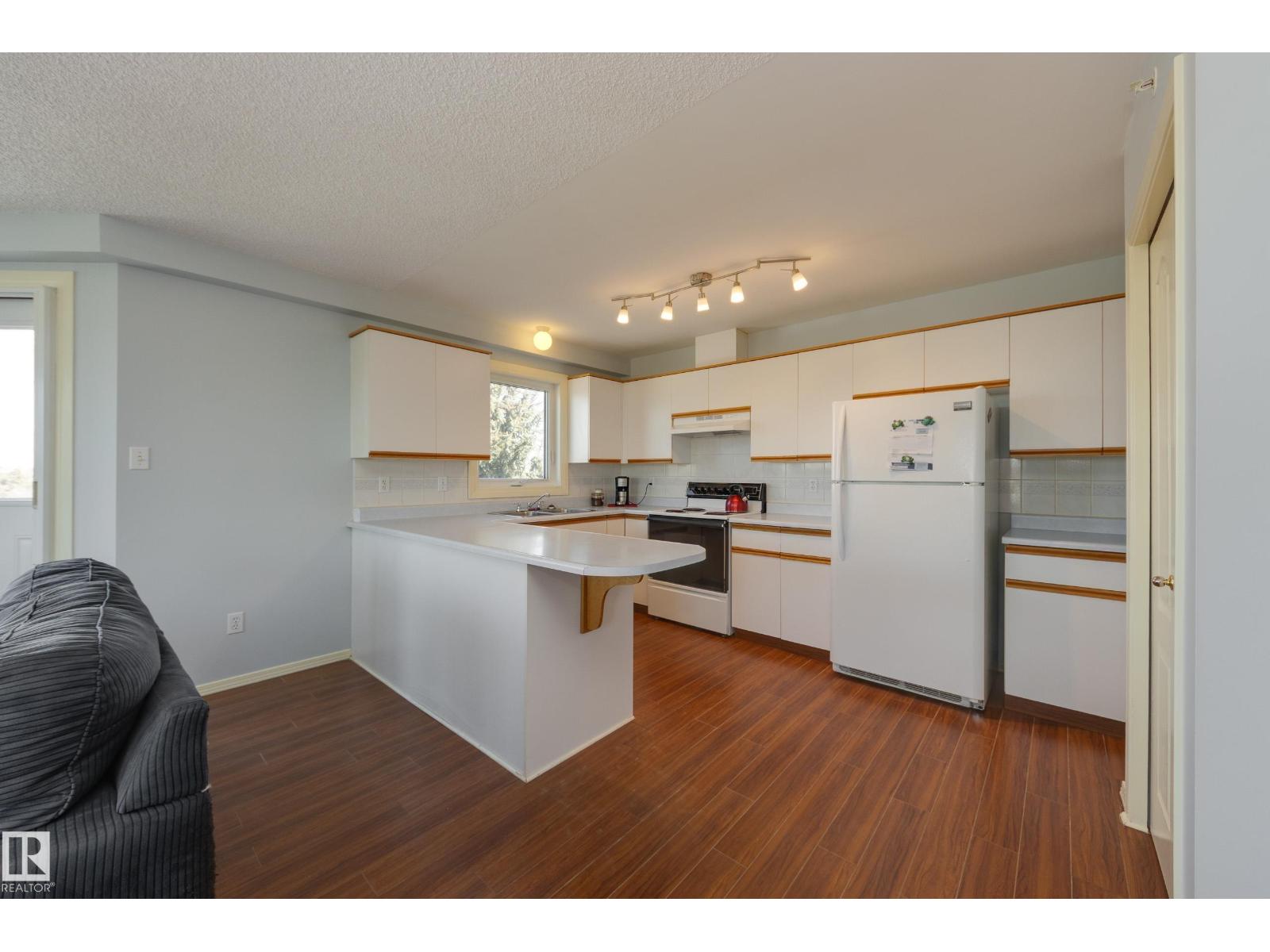 #402 10610 76 ST NW - 12