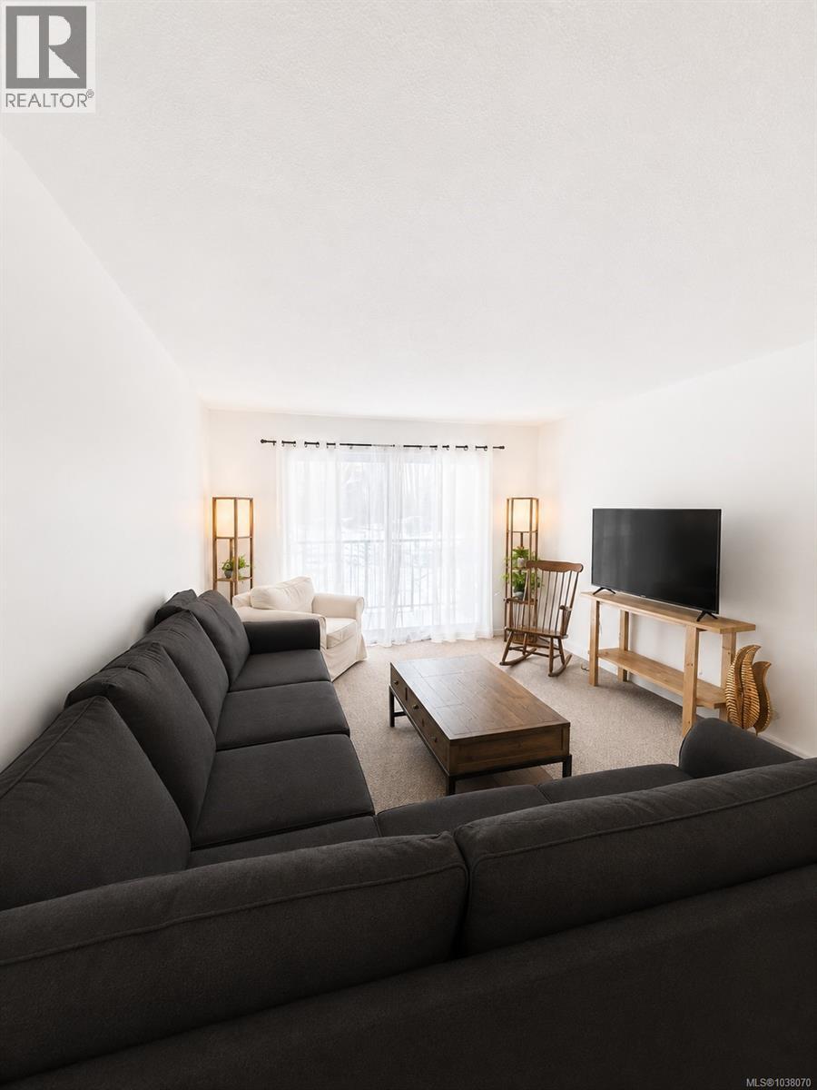#205 7450 Rupert St - 1