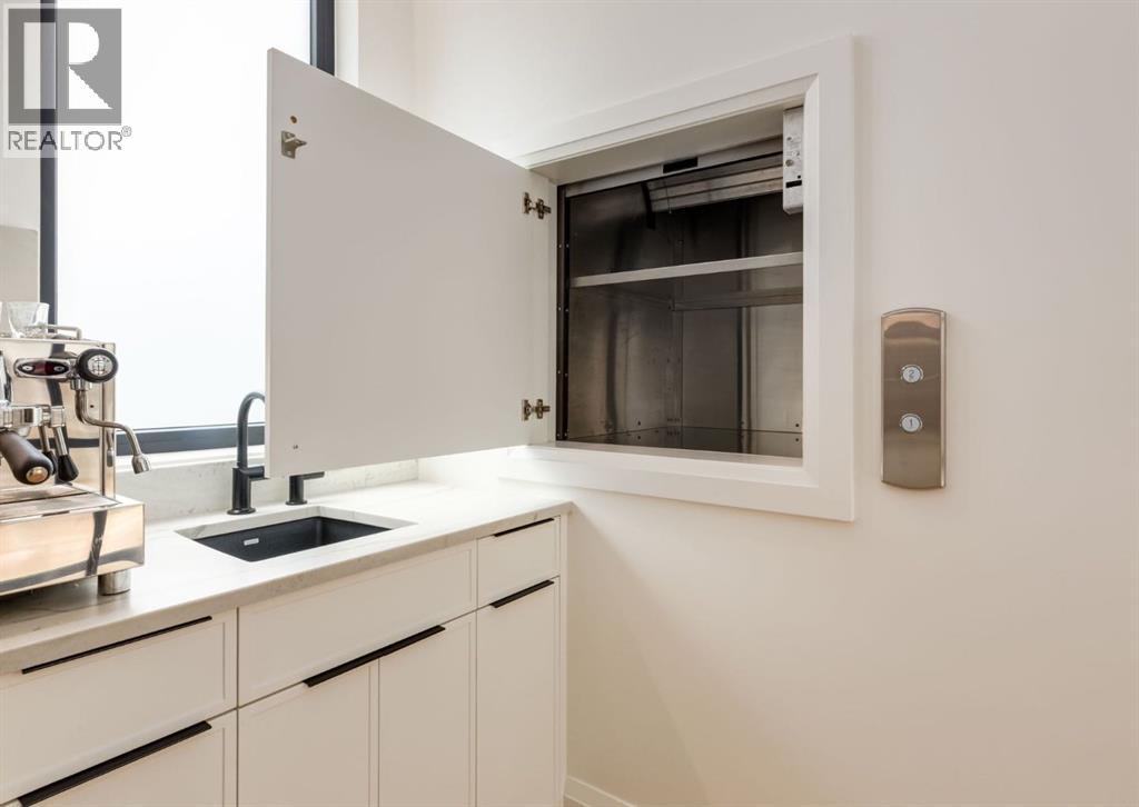 Dumb waiter moves groceries from the mud room to the pantry