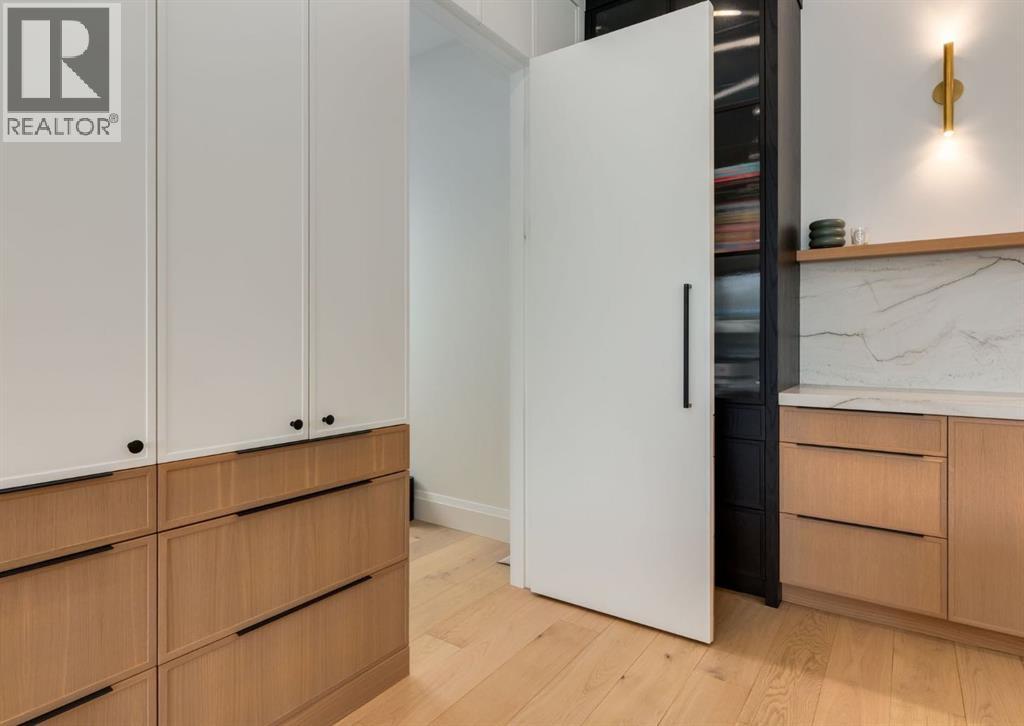 Secret entry to a secondary stairccase leading to the mud room/garage area
