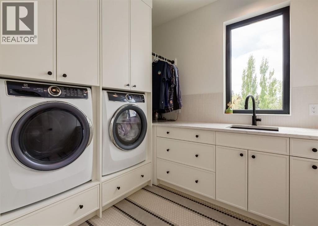 Laundry room with hidden drying rack