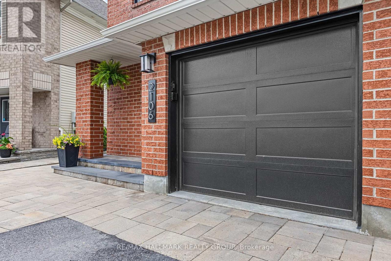 Modern garage door & interlock entrance