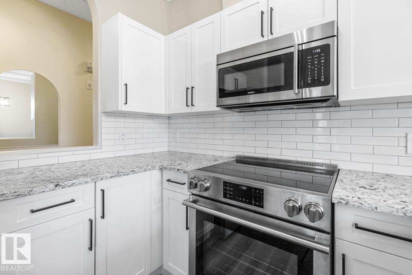 #101 8488 111 ST NW - 10