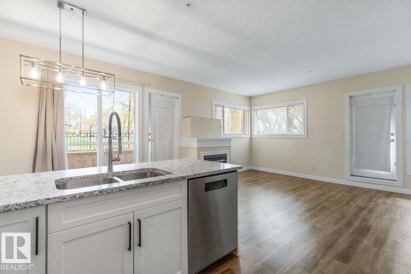 #101 8488 111 ST NW - 11